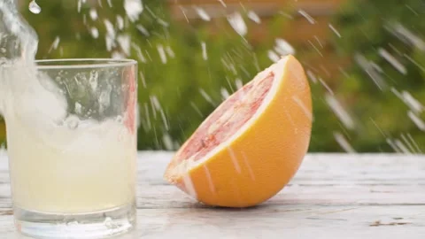 Half of red orange moving along the table Stock Footage 141602088