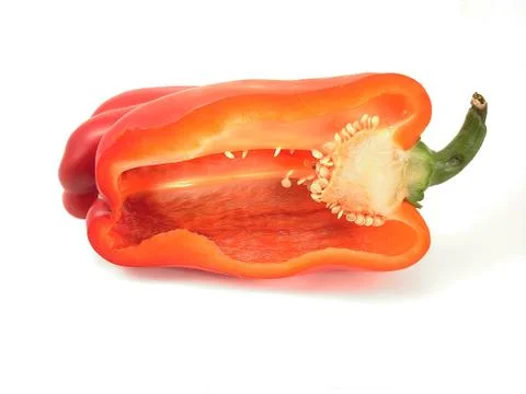 Half red pepper on white Stock Photos