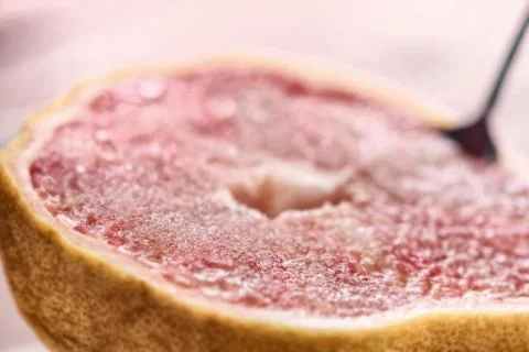 Half of ripe fresh grapefruit Stock Photos