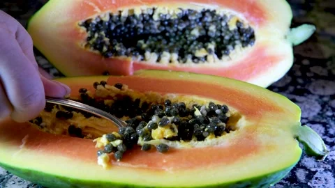 https://images.pond5.com/half-ripe-papaya-fruit-seeds-footage-239400005_iconl.jpeg