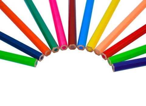 Half round circle made with different colored wood pencil crayons on a white Stock Photos