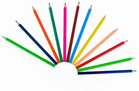 A half round circle made with different colored wood pencil crayons on a whit Stock Photos