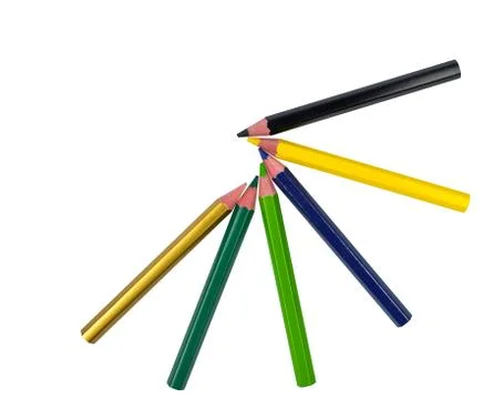 A half round pattern made with many different colored wood pencil crayons on Stock Photos