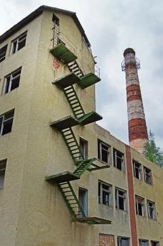 The half-ruined building of an old plant Stock Photos