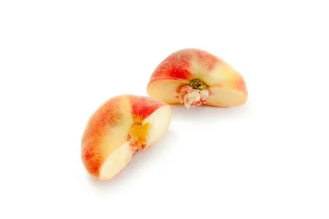 Half of saturn peach or flat peach isolated on white background with clippi.. Stock Photos