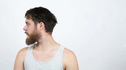 Half shaved head guy with a beard.Haircut before and after. Stock Footage 122216778