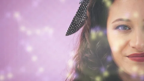 Half-side face of attractive young girl with kinky hair and black headband is Stock Footage 125993724