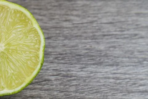 Half slice of lime Stock Photos