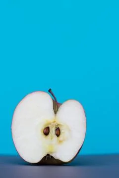 Half of a sliced red apple Stock Photos