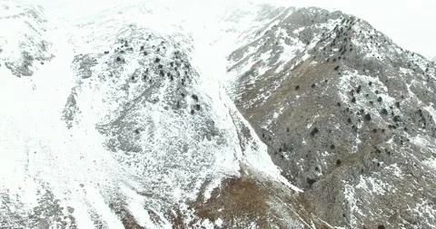 Half Snow Covered Mountain, 4k Resolution Aerial Shot Stock Footage 171251481