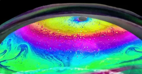 Half soap bubble texture pattern on a dark background Foto stock