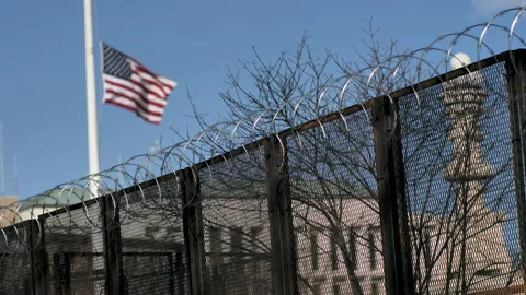 Half Staff Flag Barbed Wire RF Supreme Court Lockdown Stock Footage 146997950