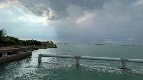 Half Sun Ray from Cloudy Sky at Sea Stock Footage 222672721