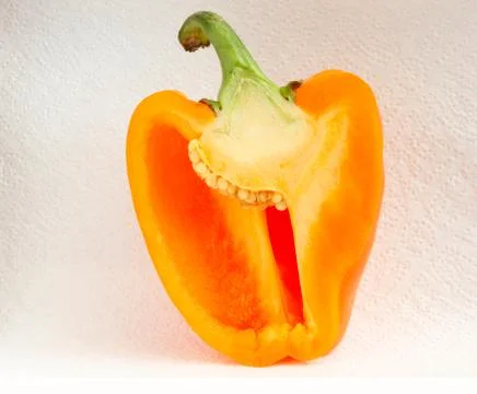 Half of sweet pepper  on white background Stock Photos