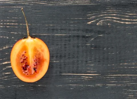 Half tamarillo fruit Foto stock