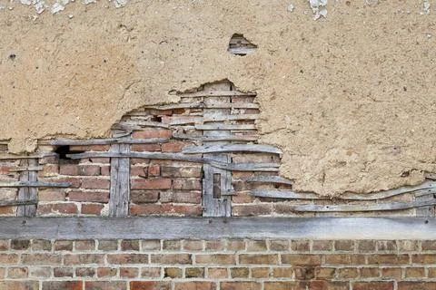 Half-timbered brick wall covered with daub Stock Photos