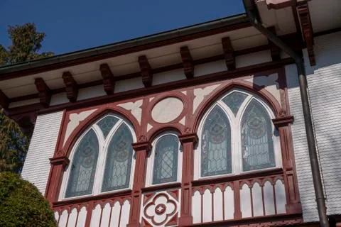 Half-timbered facade with arched windows Stock Photos