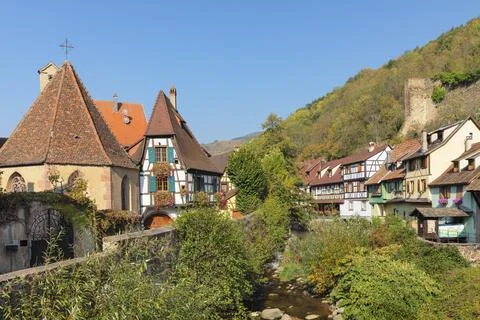 Half-timbered houses along Weiss River, Kaysersberg, Alsace, Alsatian Wine Stock Photos