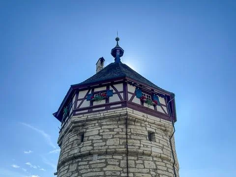 Half-timbered stone tower with sun glow, medieval architecture, Stock Photos