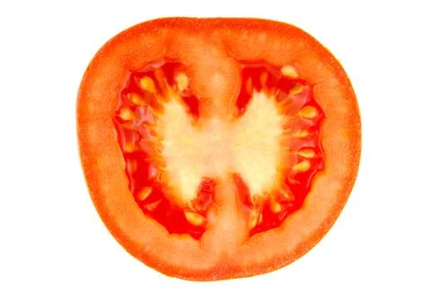 Half a tomato isolated on white background. Stock Photos