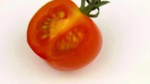 Half tomato on a white background Stock Footage 83055662