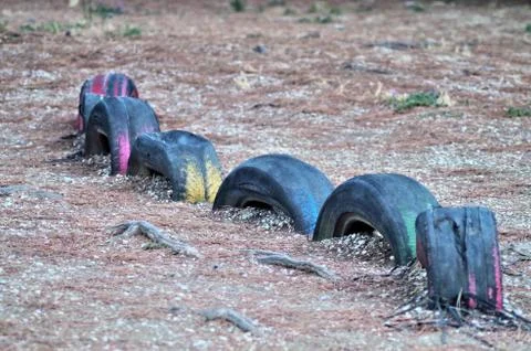 Half tyres on the ground Stock Photos