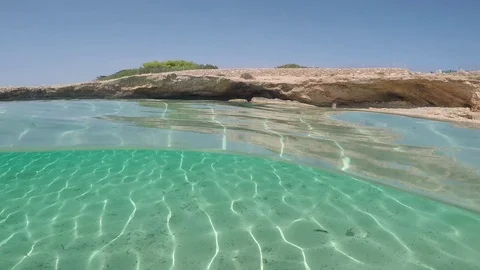 Half underwater on Koufonissi, Greece Stock Footage 80432437