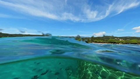 Half underwater view of santa giulia coastline in corsica Stock Footage 278952513