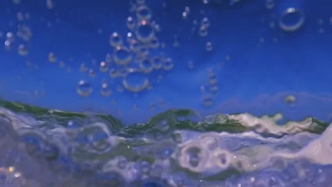 Half underwater view of sea waves crashing on camera, slow motion Vídeo Stock 279425274
