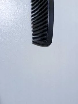 Half view of black comb. Isolated Objects Stock Photos