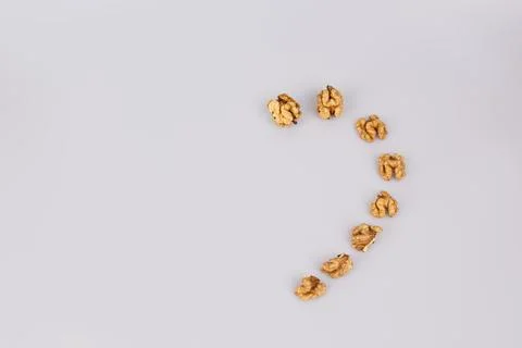 Half a walnut isolate. Peeled walnut on white. Walnut top view. Set with clip Stock Photos