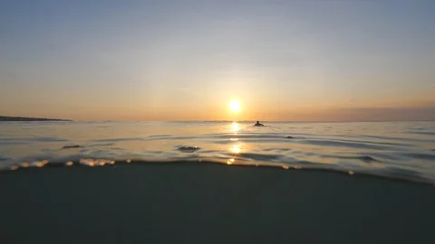 Half Water shot of surface of the ocean in sunset light Stock Footage 90005595