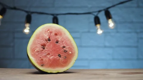 Half watermelon on the table Stock Footage 142885083