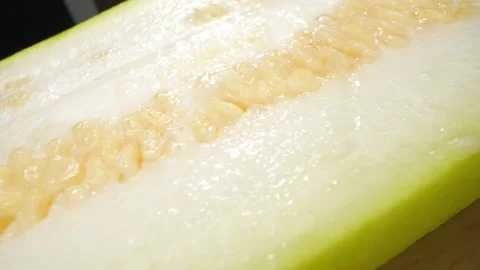 Half wax gourd macro video showcases the intricate details Stock Footage 244801099