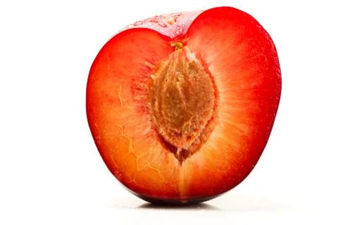 Half wet plum Stock Photos