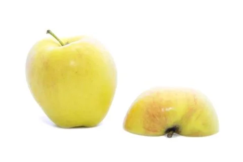 Half yellow apple upside down with raw Stock Photos