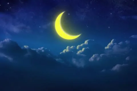 Half yellow moon behind cloudy on sky and star at night. Outdoors at night. l Stock Photos