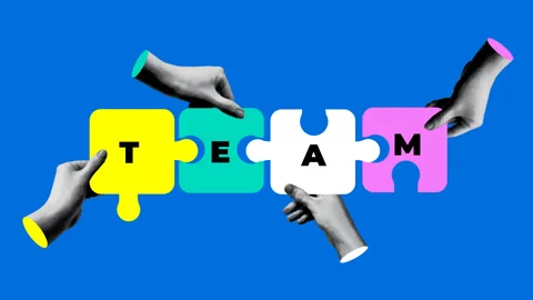Halftone hands holding puzzle pieces with inscription Team Stock Footage 330285241