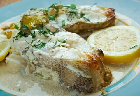 Halibut in lemon cream Stock Photos