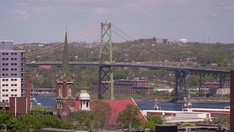 Halifax nova scotia angus l macdonald suspension bridge skyline Stock Footage 84319486