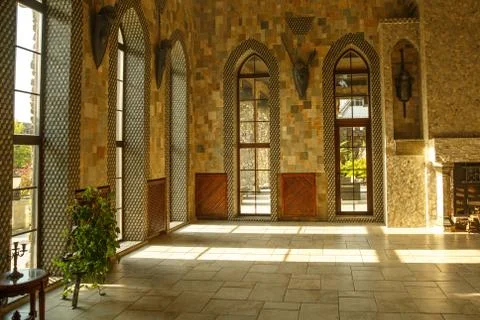 Hall of castle palace with large windows. Stock Photos