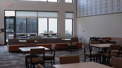 The hall of an empty interior of a bar, pub, restaurant without people. Stock Footage 160473239