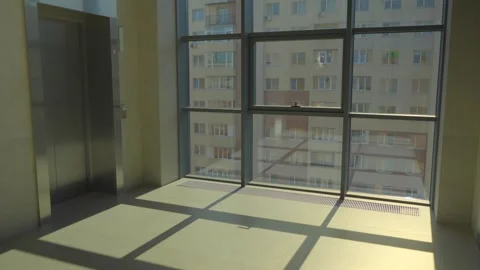 Hall near the elevator area. A residential building in the background Stock Footage 287740361