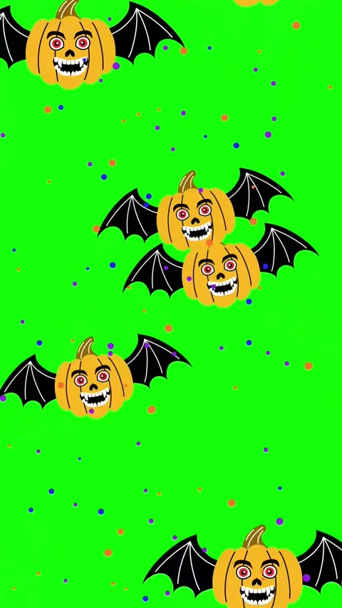 Halloween background with flying pumpkins and colorful confetti on a green .. Stock Footage 311443831