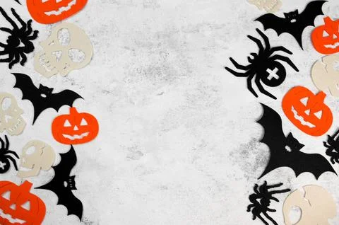 Halloween banner with different attributes on both sides with place for text. Stock Photos
