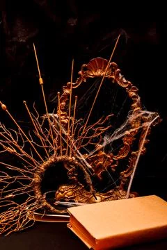 Halloween book composition, spider web, old vintage frame on a black background Stock Photos