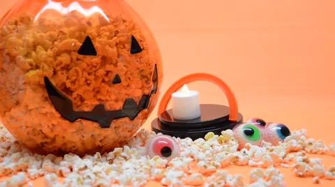 Halloween bowl full of popcorn, candy eyes Stock Footage 43062453