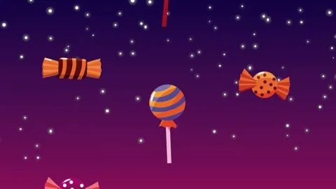 Halloween candy and lollipops falling on purple starry background with moti.. 库存影片 333897929