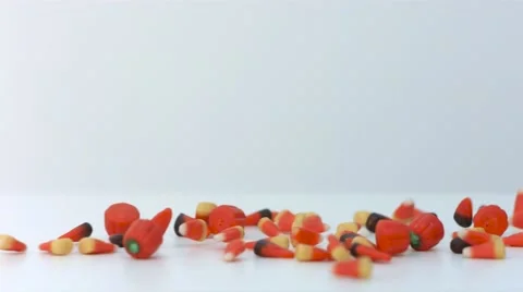 Halloween candy mix on a white table Stock Footage 54637806