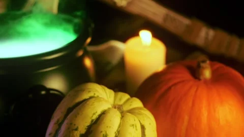 Halloween cauldron scene with pumpkins and candles Stock Footage 286771402
